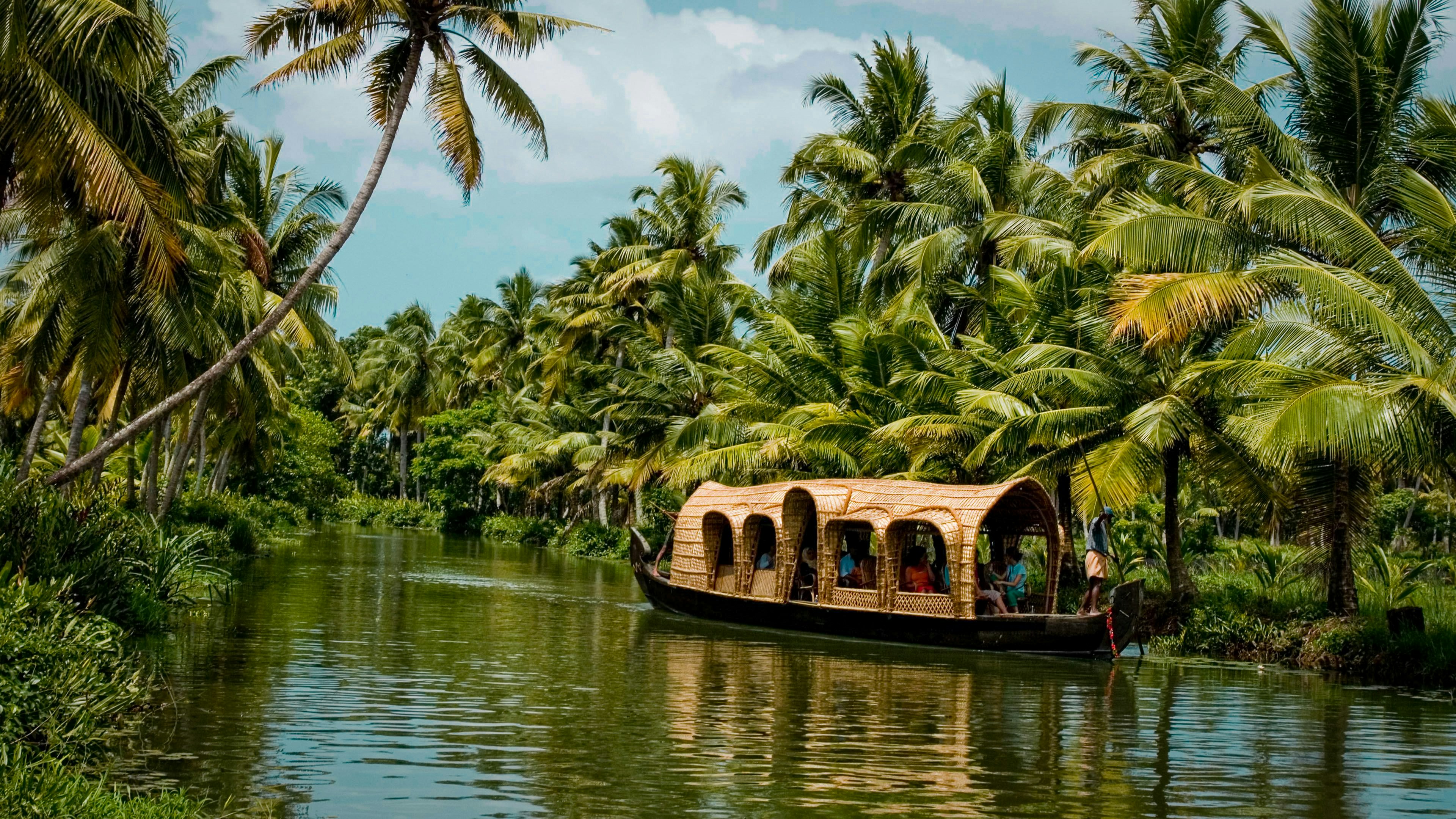Known as the "Venice of the East," famous for houseboat stays and Vembanad Lake.